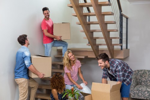 Organized storage space in Belgravia with packed boxes and furniture