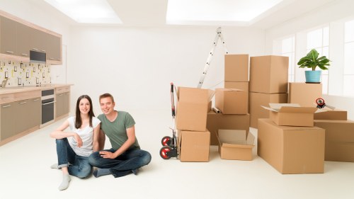 Removal van and packed boxes in a Belgravia street